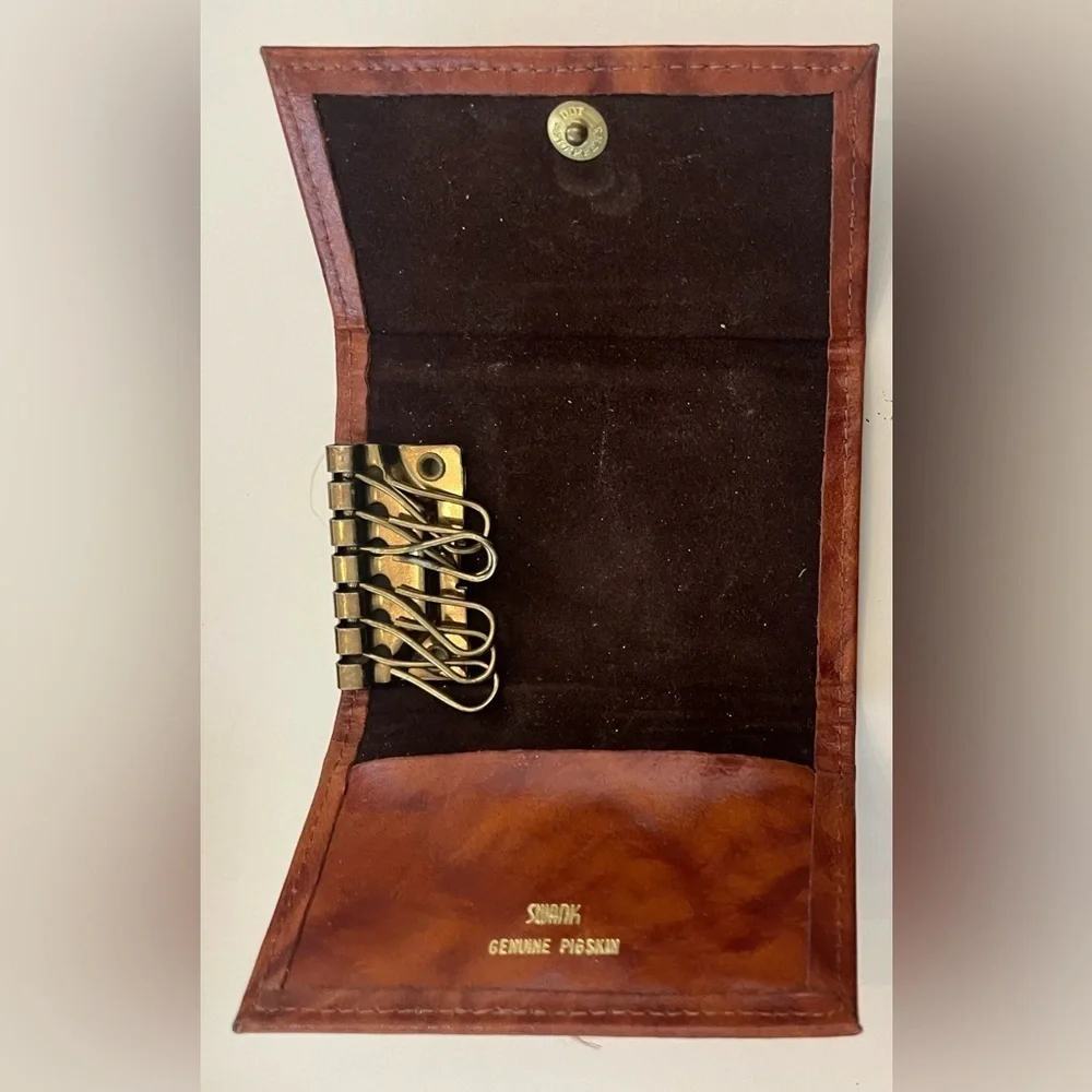 Vintage Rolf’s genuine pigskin billfold in original box